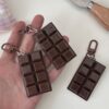 Wholesale Simulation chocolate keychain food play black smart pendant white chocolate car bag ornaments girlfriends gift