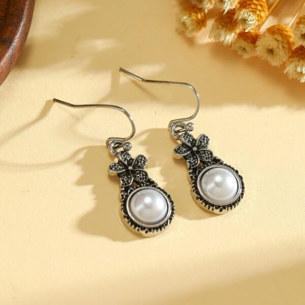 oly-9cf6399a7f1554067bc8f9fee72df98c Wholesale Vintage sier-plated flower earrings inlaid with pearls