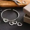 304 Stainless Steel Stainless Steel Heart Shape PVD Coated 18K Real Gold Plated Simple Style Commute Plating Bangle