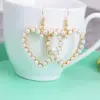1 Pair Simple Style Heart Shape Alloy Inlay Pearl Women's Earrings