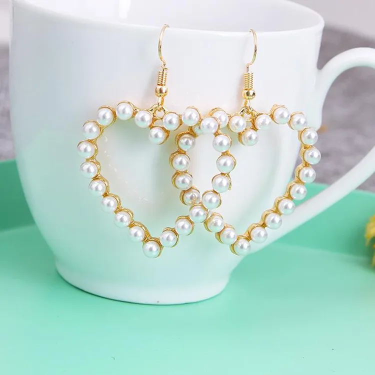 Wholesale 1 Pair Simple Style Heart Shape Alloy Inlay Pearl Women's Earrings