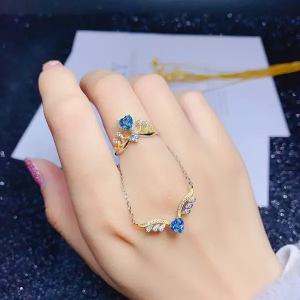 Wholesale New Angel Wing Necklace Heart-shaped Blue Topaz Color Ring Pendant Copper Set