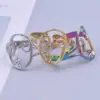 oly-9ee615deeb709e3a117c9d981293a83f Wholesale PVD Coated Real Gold Plated 18K Gold Solid Color 304 Stainless Steel Simple Style Waterproof Non Tarnish Rings