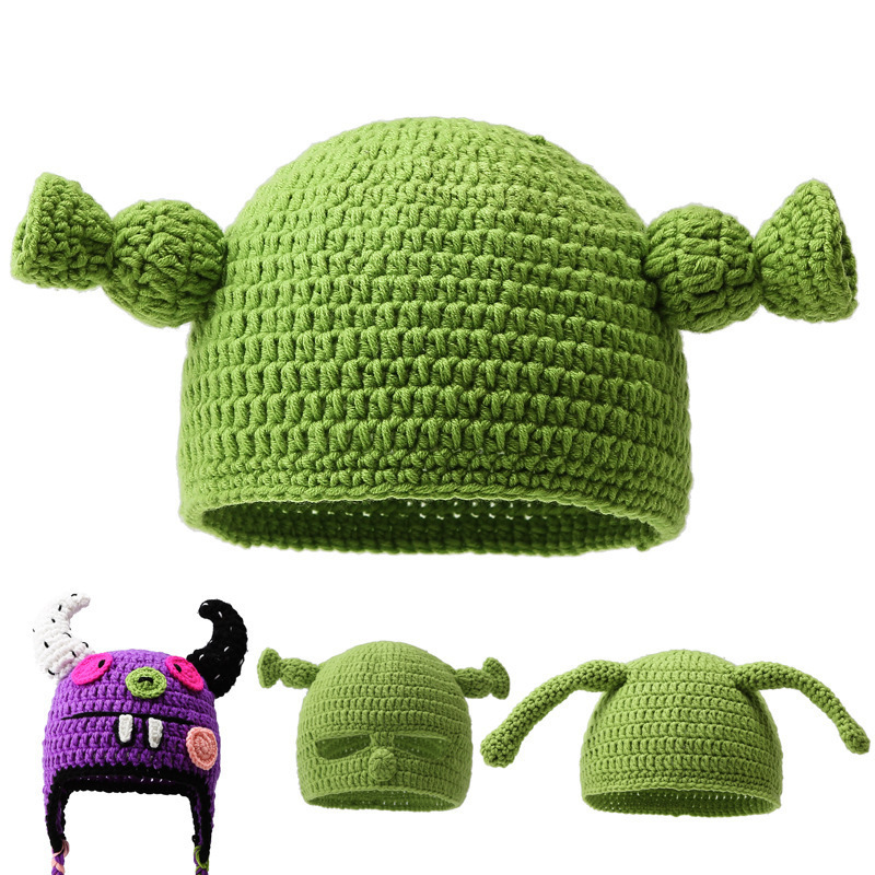 Wholesale Funny and warm woolen hat for women, autumn and winter, long braid, green knitted pullover hat, trendy and thick.