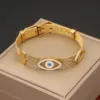Wholesale PVD Coated 18K Gold Real Gold Plated Devil'S Eye Stainless Steel Vintage Style Luxurious Waterproof Non Tarnish 304 Stainless Steel Bangle
