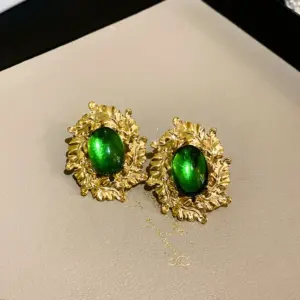 23# silver needle green mid-ancient oval earrings