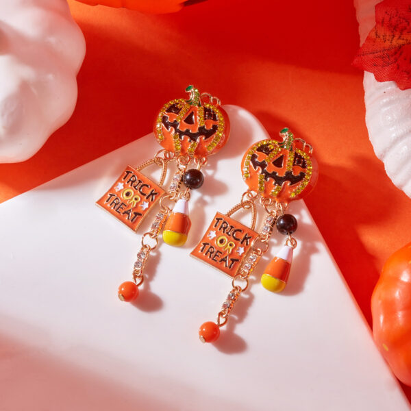 Wholesale Hot-selling European and American cross-border e-commerce style: dripping rhinestone pumpkin earrings; Temu's best-selling letter-themed Halloween tassel earrings.
