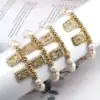 Wholesale Fashion Portrait Faith Cross Copper Gold Plated Zircon Bracelets In Bulk