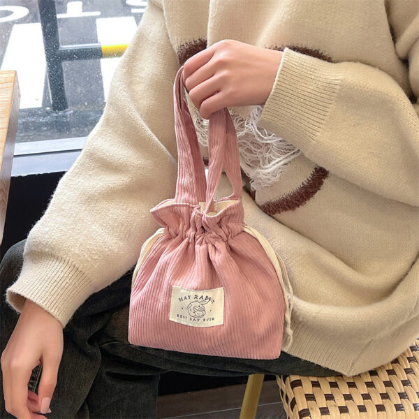 oly-a2f99d725d692bee80bac1a773d72150 Wholesale MAY RABBIT corduroy awstring bag large capacity handbag storage bag canvas bag with hand gift awstring bag fashion