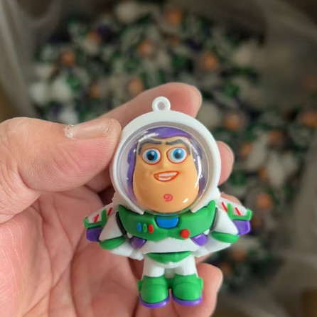 Wholesale 50 Toy Story Doll Keychain Three-eyed Buass Lightyear Strawberry Bear Bag Hanging Doll Machine