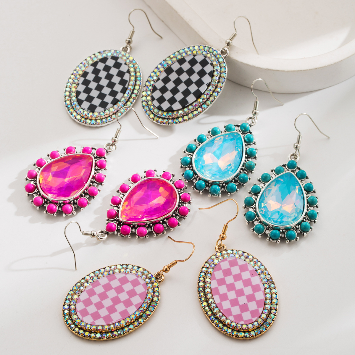 Wholesale Diamond-encrusted tearop-patterned turquoise pendant earrings for women, unique vintage style, high-quality party earrings.