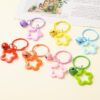 Wholesale Colorful five-pointed star acrylic keychain pendant dopamine earphone case ornaments small fresh couple bag decoration