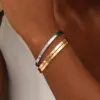 Wholesale 304 Stainless Steel Stainless Steel Solid Color PVD Coated 18K Gold Plated Elegant Retro Plating Hollow Out Rose Gold Gold Silver Bangle