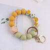 Wholesale In-Stock Temu Silicone Bead Bracelet Beech Wood Octagonal Print Silicone Wrist Keychain Pendant Bracelet