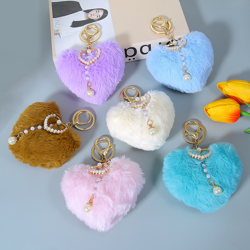 Wholesale Autumn and winter love fur ball pearl keychain peach heart bag pendant car aessories plush pendant small gifts
