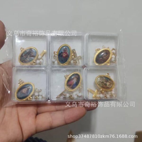 Wholesale A set of 6 brooches with different patterns, including crosses, for baptismal religious purposes.