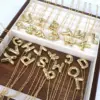 Wholesale Simple Style Classic Style Letter Copper 18k Gold Plated Pendant Necklace In Bulk