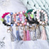 Wholesale New cross-border hot selling silicone beaded bracelet keychain pendant PU leather tassel cactus cross accessories