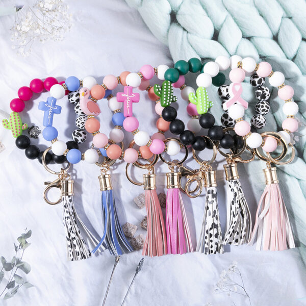 Wholesale New cross-border hot selling silicone beaded bracelet keychain pendant PU leather tassel cactus cross accessories