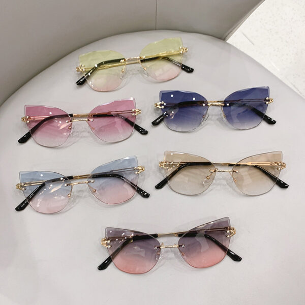 oly-a5e50aac661da2c97048a5ad0d833fc3 Wholesale Cross-border in stock new frameless trim sunglasses fashion cat's eye gradient sunglasses Europe and the United States retro Internet red explosions