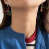 oly-a677fbfb92dfe0fb1e4a26321a4728f1 Wholesale Retro colored asymmetrical earrings