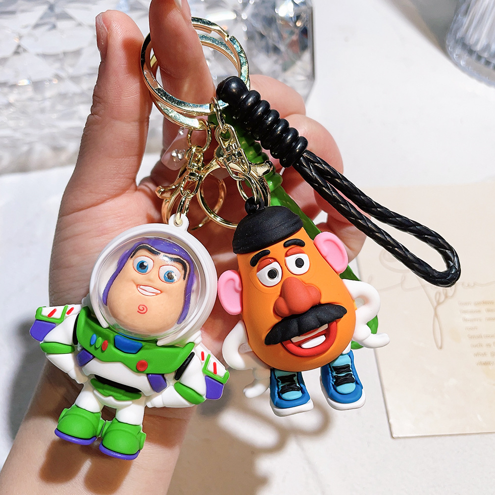 Wholesale Cute Doll Keychain Three-eyed Buass Lightyear Strawberry Bear Bag Hanging Doll Machine