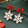 Wholesale Christmas openwork snowflake bow earrings