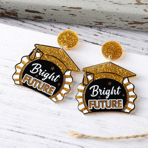 oly-a7d311f701dfd63ac3964548922c334e Wholesale Cross-border New School Season Sequins Book Master's Cap Star Stitching Pendant Earrings Acrylic Earrings