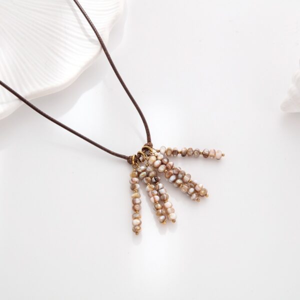 oly-a7f04c2e2ed6a0757a79d6cc67aadf49 Wholesale Shell Tassel Beaded Necklace