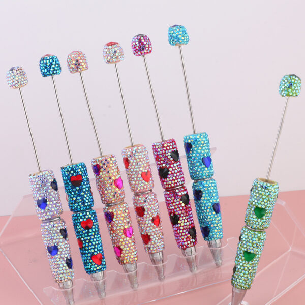 oly-a807c36e94661d143af09b3441b08f9a Wholesale Cross-border Live Hot Selling Colorful Love Heart Zircon Diamond Pen Ceramic Mud Full Diamond Beaded Pen DIY Beaded Aessories