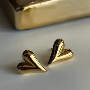 Gold stud earrings