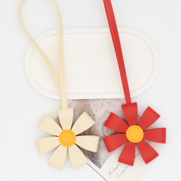 Wholesale Premium PU leather 3D multi-petal flower bag charm keychain ornament