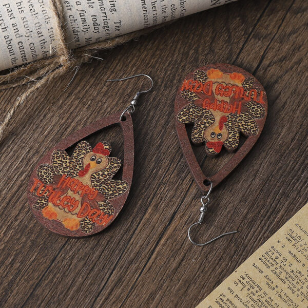 oly-a891d9b8fc44790f0d2855253623ca71 Wholesale New cross-border Thanksgiving leopard print polka dot turkey teardrop-shaped hollowed-out pendant earrings, distressed wooden double-sided earrings