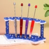 Wholesale Sugar pen holder display stand with cross-string pen display stand