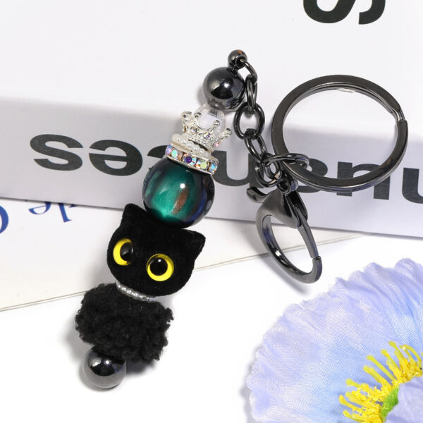 oly-a8cf335c01920d6885553ba02ac57c15 Wholesale Flocked Cartoon Big-Eyed Cat Head Beaded DIY Phone Chain/Keychain Aessories