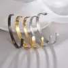 PVD Coated Gold Plated Solid Color 201 Stainless Steel Simple Style Cuff Bracelets