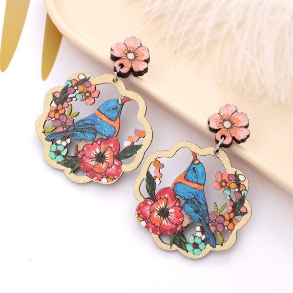 Wholesale New Bohemian Style Coconut Tree Flower Bird Hollow Earrings Love Earrings Personalized Fashionable European and American Earrings