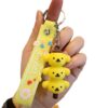 oly-ab16009a938ecfc1c4809be166d3495b Wholesale Sanrio Yugui dog jengle keychain cute cartoon melody pudding dog PVC doll bag pendant