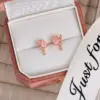 Wholesale 1 Pair Fashion Flower Inlay Copper Zircon Ear Studs