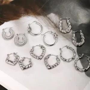 Wholesale 1 Pair Retro XUPING Simple Style Geometric Knot 304 Stainless Steel Earrings