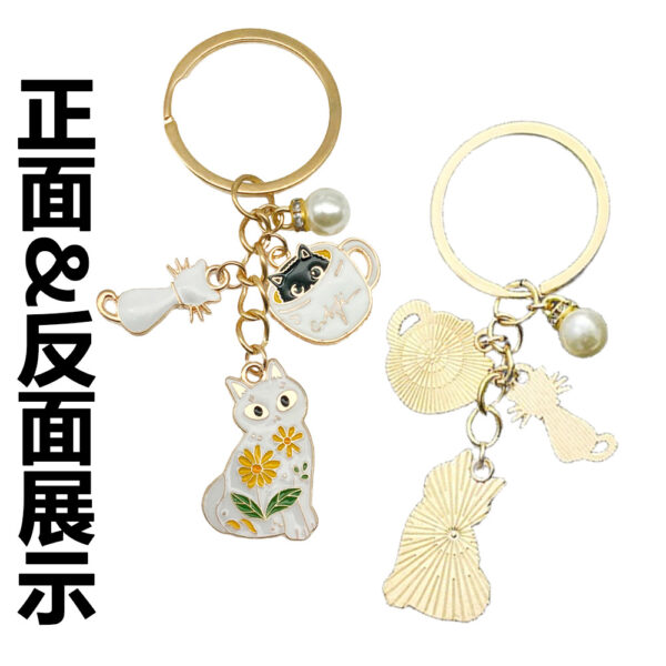 Wholesale Cross-border Hot Cartoon Oil Dropping Pearl Tea Cup White Cat Keychain Metal Alloy Bag Jewelry Pendant