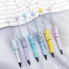 Wholesale DIY Sun Moon Star Beaded Pen Multicolor Sequin Ins Small Star Beaded Ballpoint Pen Handmade Patch Rotating Cute Pen