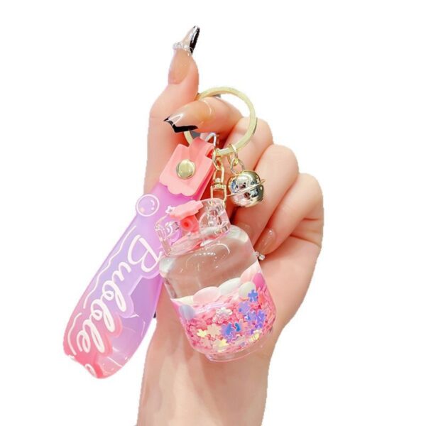 Wholesale Shake the sound explosion acrylic oil snowflake pink key chain car pendant exquisite schoolbag key ring pendant