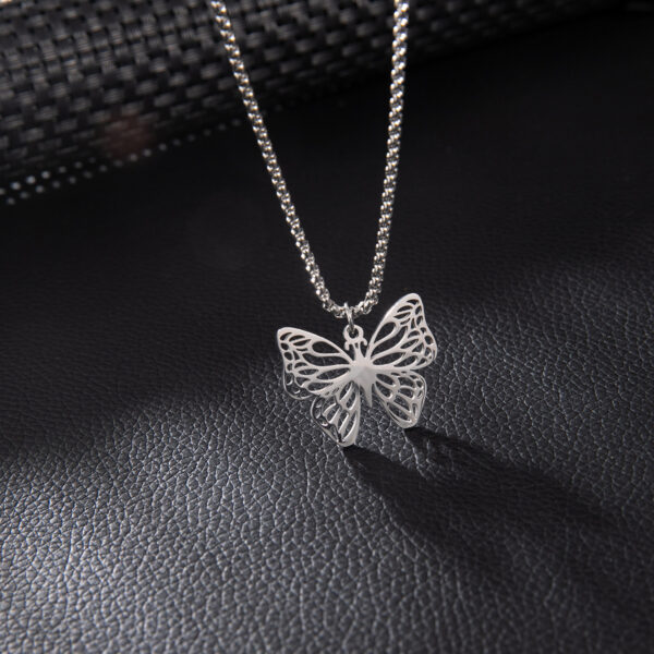 oly-ae6e5279d0bb0379d88543dd6e370e11 Wholesale aessories small stainless steel hollow volleyball plant flowers butterfly pendant necklace jewelry men