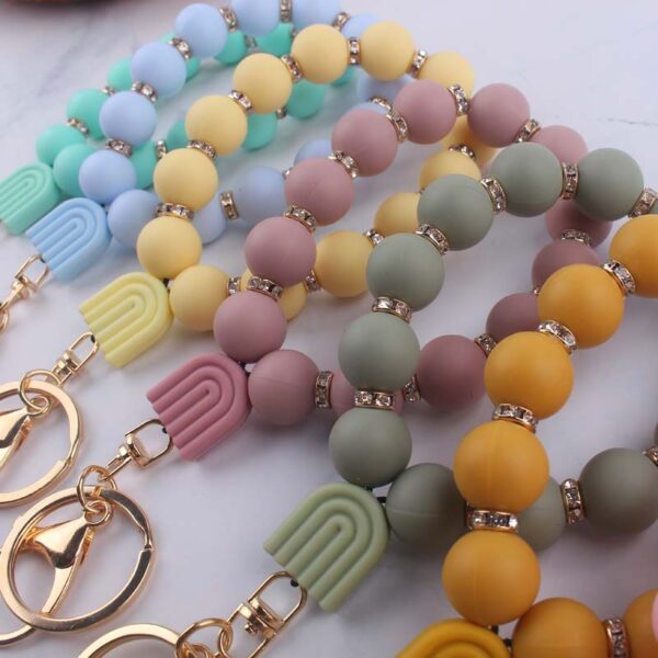Wholesale New Cartoon silicone rainbow pendant creative DIY bright silicone beaded keychain key ring jewelry