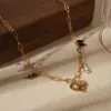 Wholesale Ion Plating (IP) 18K Gold Plated Devil's Eye Planet Red Heart 304 Stainless Steel Simple Style Commute Pendant Necklace