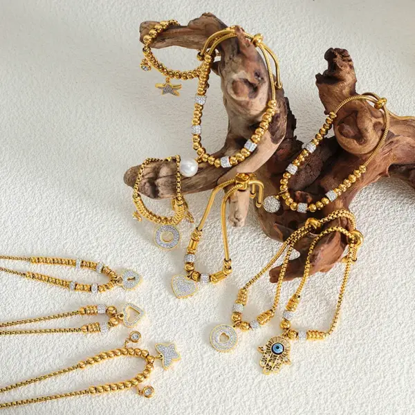 Wholesale PVD Coated Real Gold Plated 18K Gold Palm Heart Shape Eye Titanium Steel Streetwear Waterproof Non Tarnish 304 Stainless Steel Bracelets