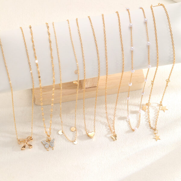 Wholesale New semi-managed cross-border European and American style fashion bow love pearl necklace 7-piece set niche design female