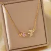Wholesale 304 Stainless Steel Copper K Gold Plated Three-dimensional Inlay Floral Zircon Pendant Necklace