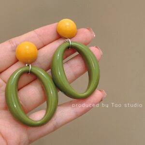 Yellow green oval ear clip